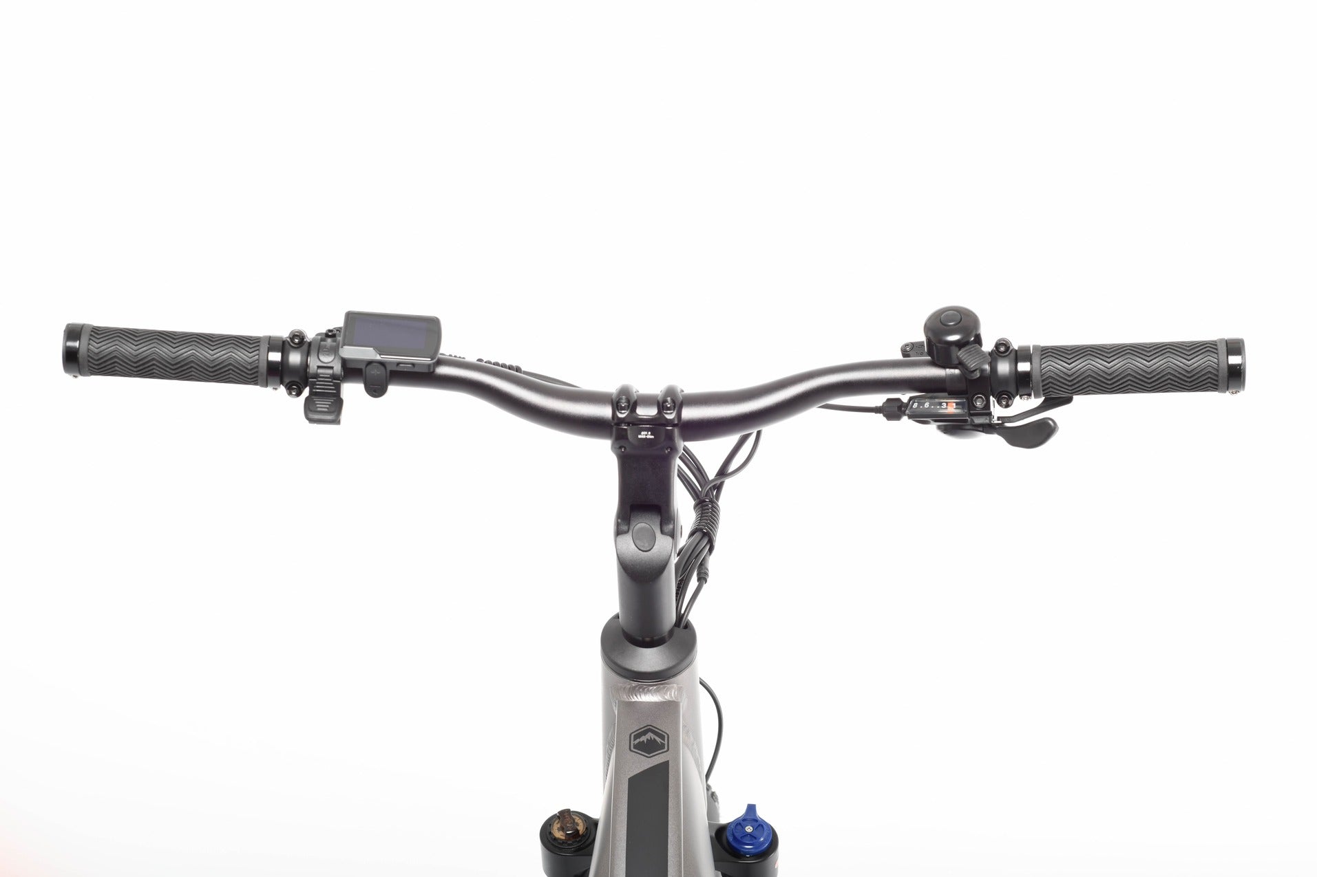 Close-up of bicycle handlebars with a white background